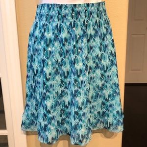 WHBM NWOT skirt size Medium. Teal, navy, silver